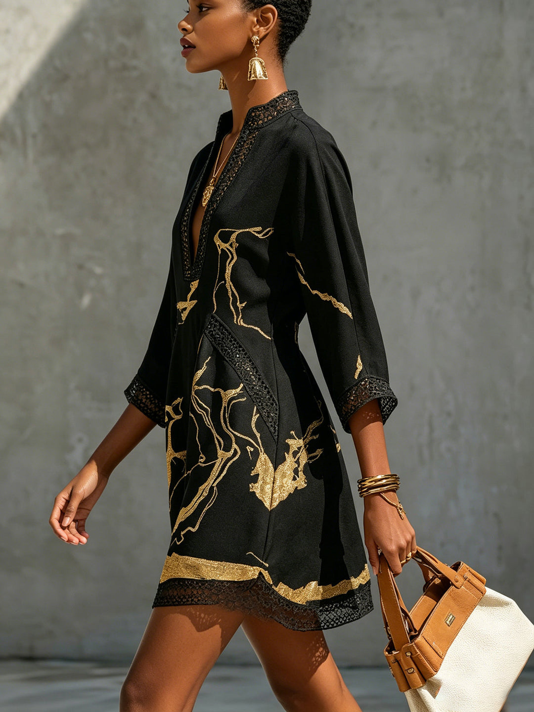 Léonie | Black Crocheted Lace Mini Dress with Gold Accents and V-Neck