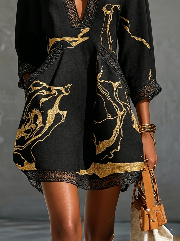 Léonie | Black Crocheted Lace Mini Dress with Gold Accents and V-Neck