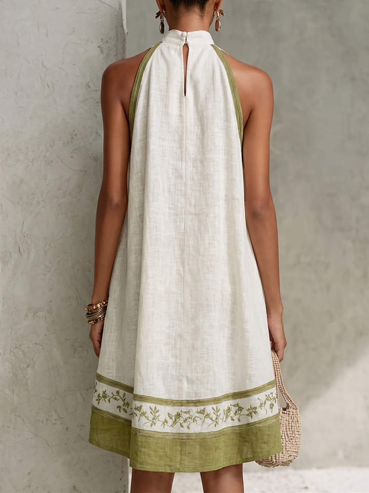 Agathe | Sleeveless A-Line Mini Dress in White and Olive Green Floral Print